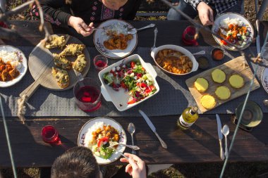 top view of family eating at table at daytime