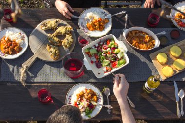 top view of family eating at table at daytime