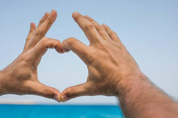 Hands Man Depict Sign Symbol Heart Love Backdrop Sea Sky — Stock Photo, Image