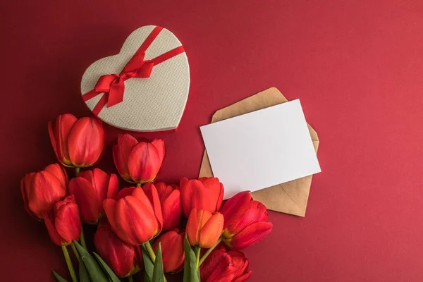Bouquet Red Tulips Gift Heart Box Isolated Red Background Spring — Stock Photo, Image