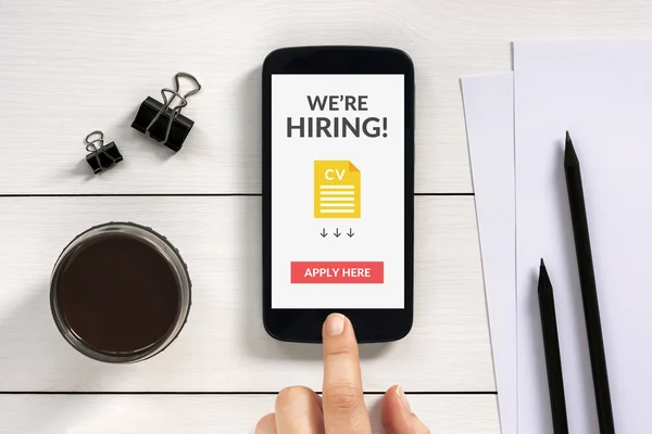 We are hiring apply now concept on smartphone screen with office — Stock Photo, Image