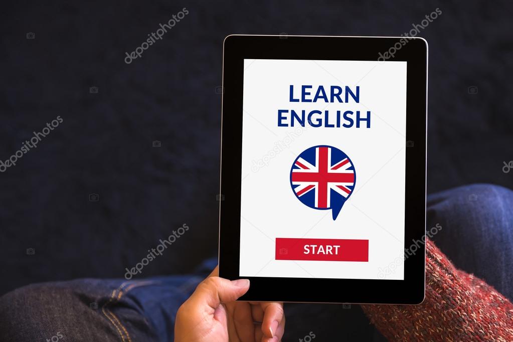 Hands holding tablet  with online learn English concept on scree