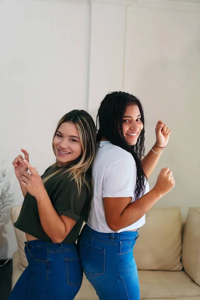 Two Hispanic Friends Smiling Having Fun Living Room Home — Stock Photo, Image