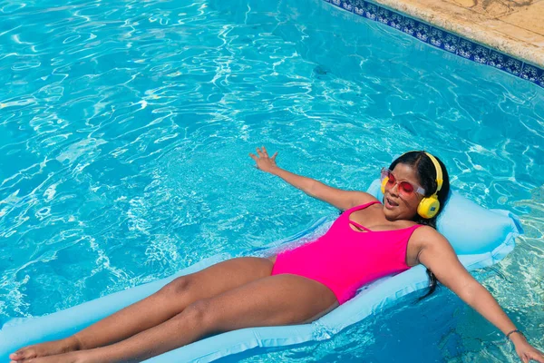 Attractive Woman Swimwear Stands Sun Listening Music Headphones Tropical Vacation —  Fotos de Stock