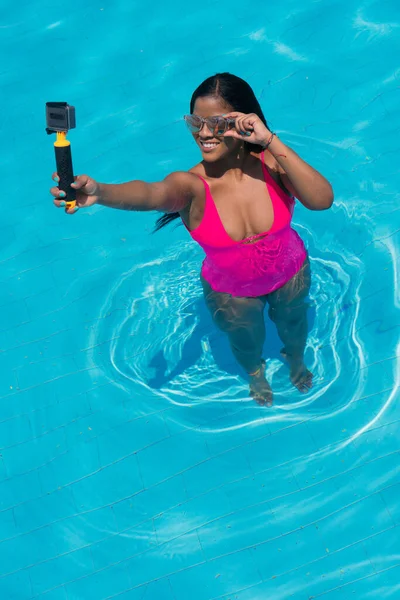 African Woman Taking Selfie Action Camera Swimming Pool —  Fotos de Stock