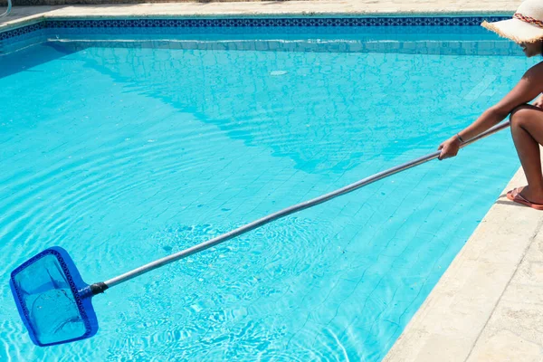 Woman Staff Cleaning Pool —  Fotos de Stock
