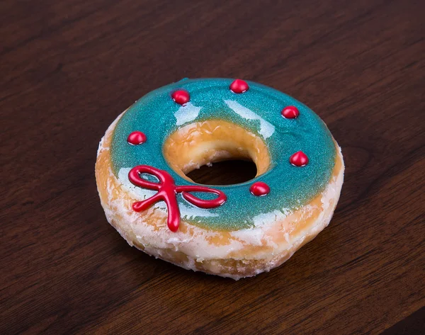 Donuts on wooden background — Stock Photo, Image