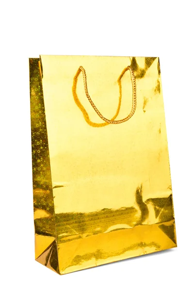 Beyaz zemin üzerine altın alışveriş torbaları — Stok fotoğraf