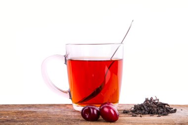 Fincan çay kaşığı ahşap arka plan üzerinde