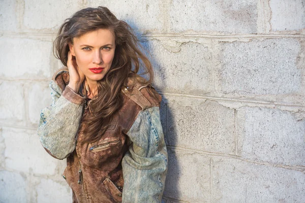 Beautiful young woman in biker boyfriend jacket — Stock Photo, Image