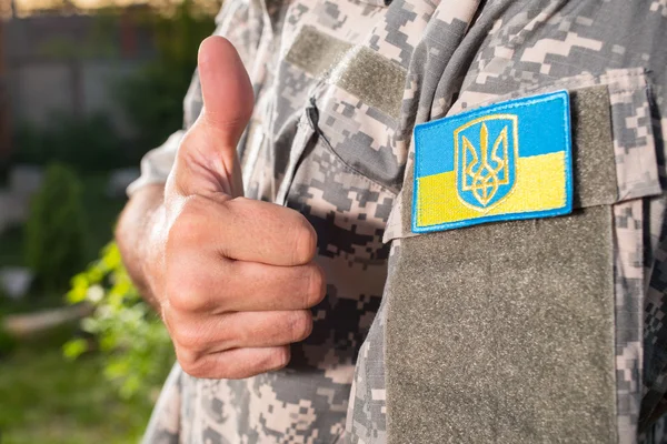 Ukrainian soldier with chevron on the uniform — Stock Photo, Image