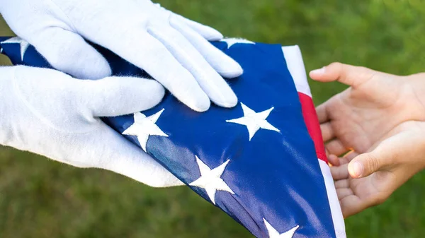 Ceremony of a giving a  folded flag - triangle flag