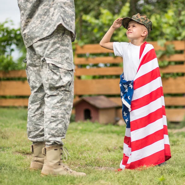 Son salutes his father — Stock Photo, Image