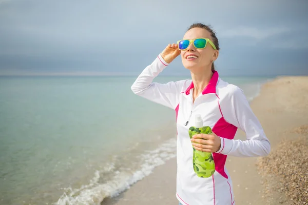 Female beach runner — Stock Photo, Image