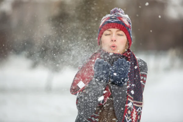 Winter woman blowing snow — Stock Photo, Image