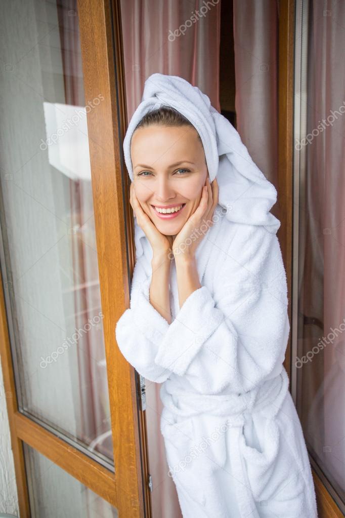 Bathrobe happy woman