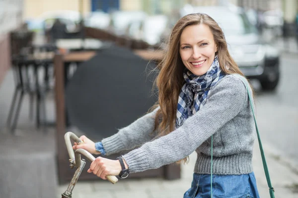 Woman on bike — Stock Photo, Image