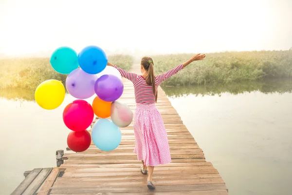 Žena s balónky — Stock fotografie