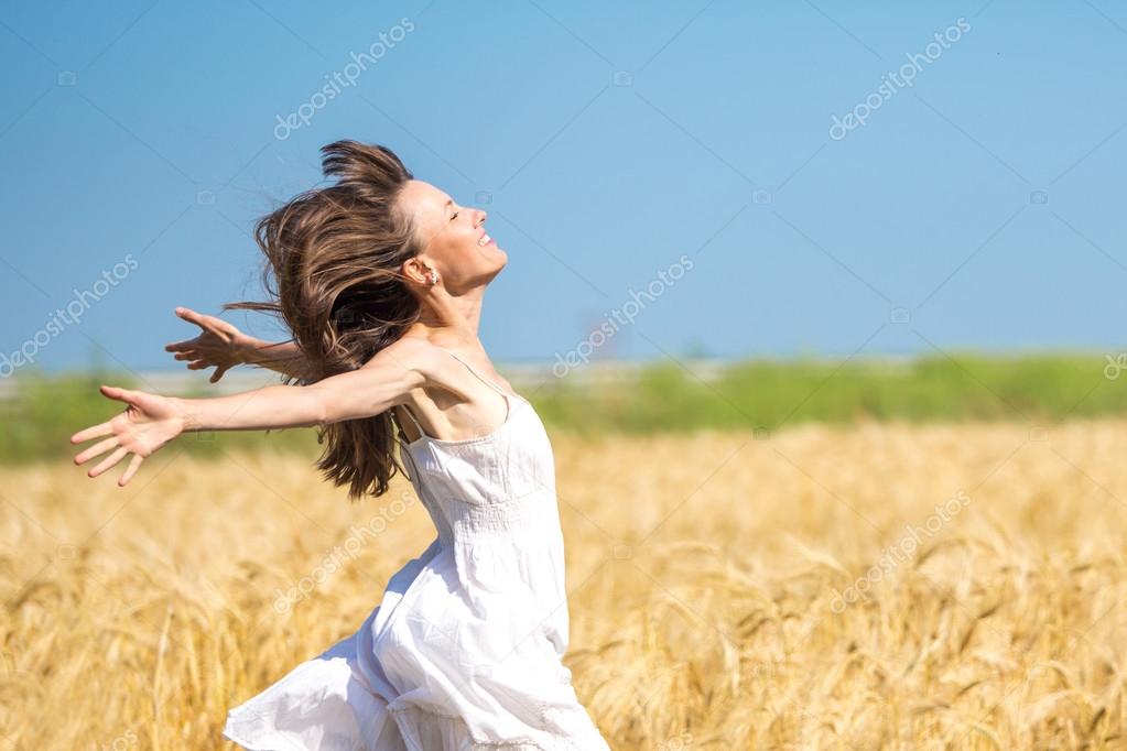 Happy girl running jumping Stock Photo by ©PEPPERSMINT 78500482