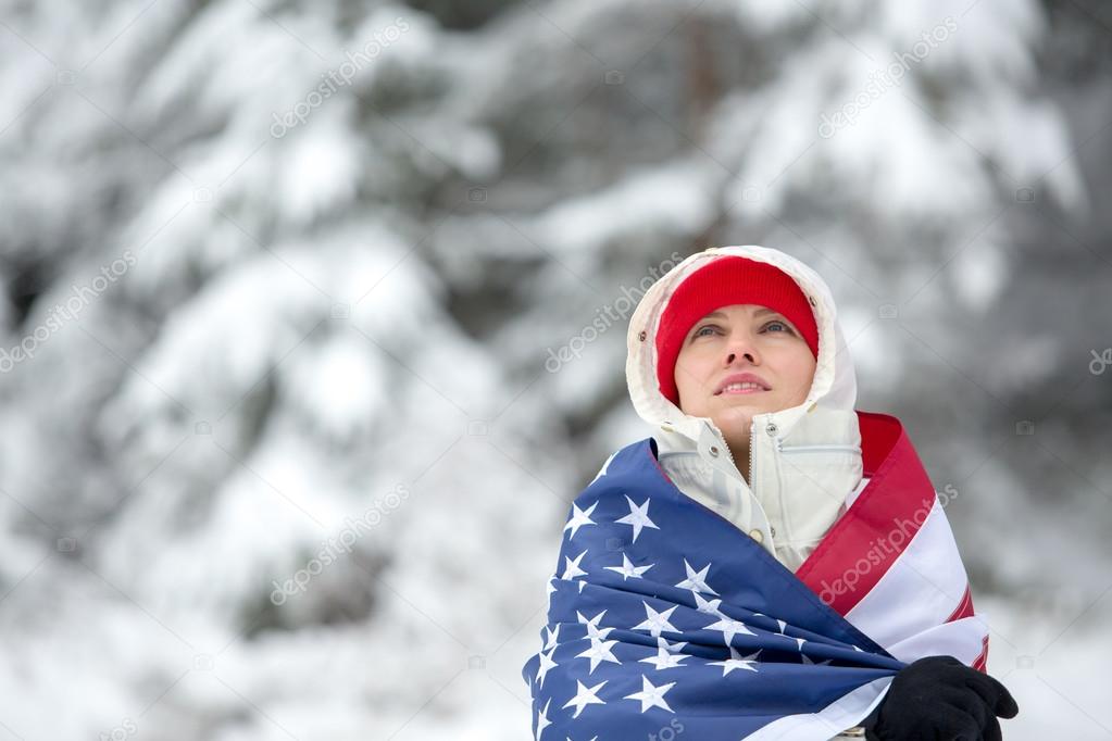Young american traveler enjoy her winter vacation outdoors