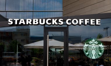 Bucharest, Romania, May 8, 2016: Starbucks logo and store front. Starbucks Corporation is an American coffee company and coffeehouse chain. it was founded in Seattle, in 1971. 