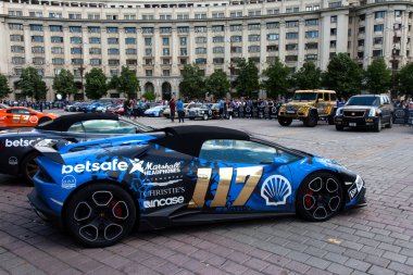 Bucharest, Romania, May 7, 2016: Super cars of the exclusive Gumboil 3000 parked in front of the Romanian Parliament. Gumball is an international celebrity rally which takes place on public roads.