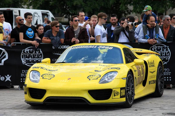 Bucharest, Romania, May 7, 2016: Super cars of the exclusive Gumboil 3000 parked in front of the Romanian Parliament. Gumball is an international celebrity rally which takes place on public roads.