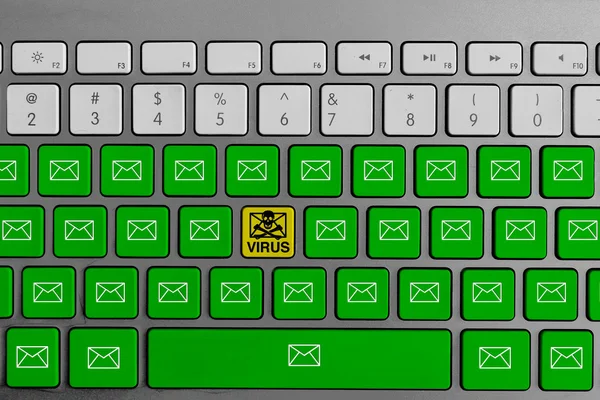 Computer keyboard with yellow email virus button surrounded with green email buttons