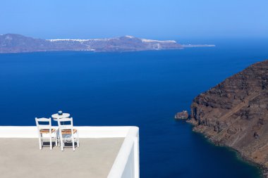 Beyaz evler ve mavi kubbeler Oia, Santorini, Panoramik manzara