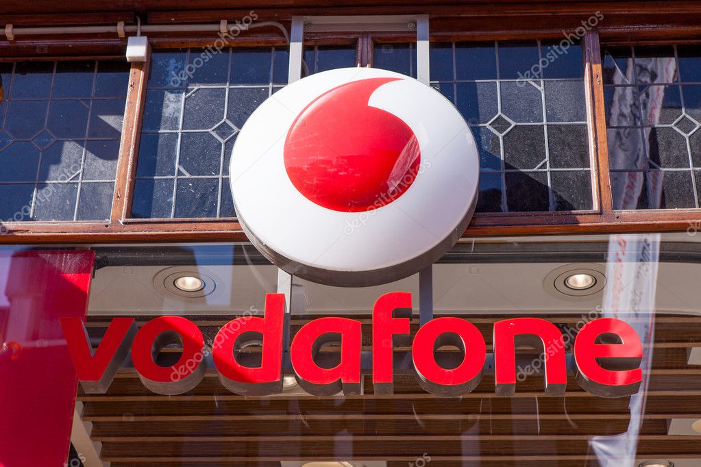 Amsterdam, The Netherlands, August 23, 2016: Vodafone logo. Vodafone Group is a British telecommunications company headquartered in London and with its registered office in Newbury, Berkshire.