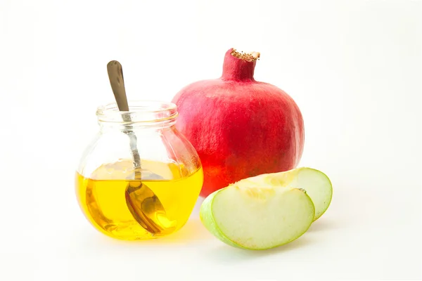 Rosh Hashanah Kiddush xícara de mel romã e maçã fatiada — Fotografia de Stock