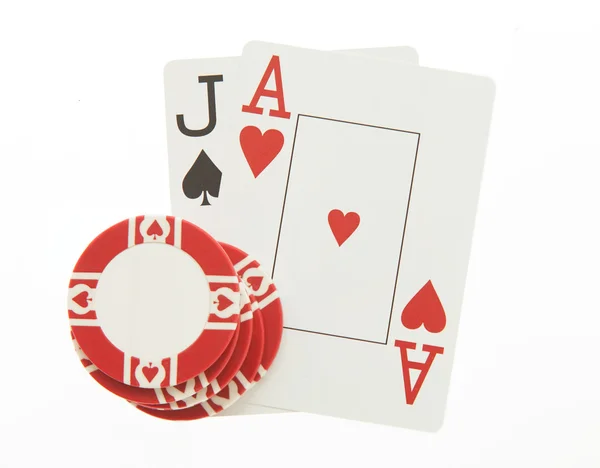 Blackjack hand with casino chip — Stock Photo, Image