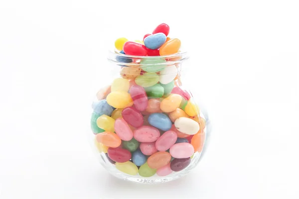 Jelly beans with a glass jar — Stock Photo, Image