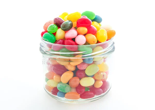 Jelly beans with a glass jar — Stock Photo, Image