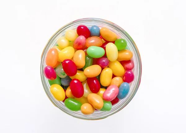 Jelly beans with a glass jar — Stock Photo, Image