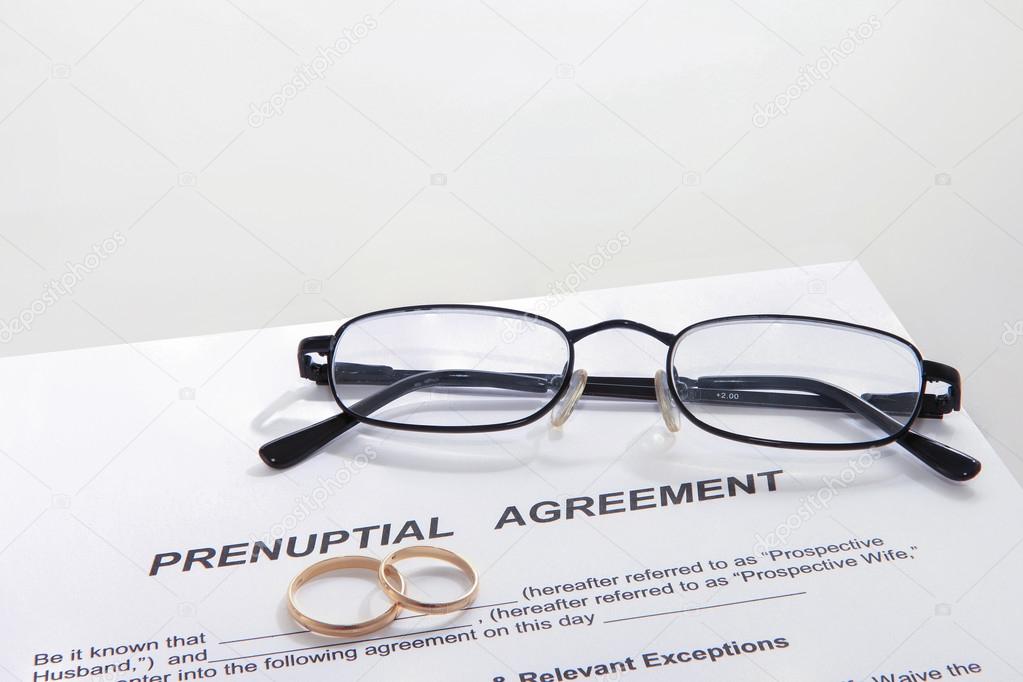 Prenuptial Agreement with wedding rings
