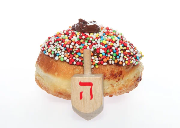 Hanukkah doughnut - Traditional jewish holiday food. — Stock Photo, Image