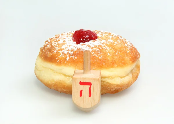 Hanukkah doughnut - Traditional jewish holiday food. — Stock Photo, Image