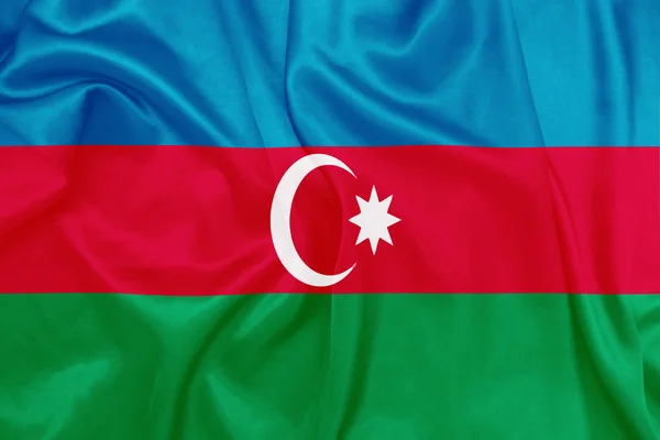 Azerbaiyán - ondeando bandera nacional sobre textura de seda —  Fotos de Stock