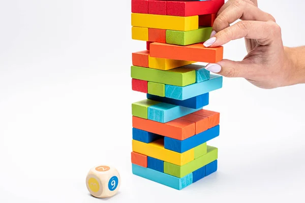 Tower game. Family Game Colored Wooden Cubes