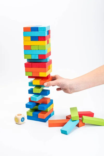 Tower game. Family Game Colored Wooden Cubes