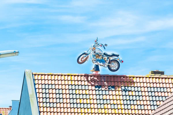 Strange Harley Davidson on the roof — Stock Photo, Image