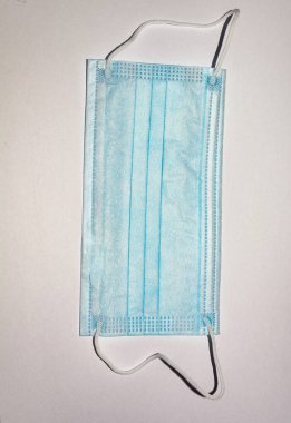 Beyaz arka planda tıbbi koruyucu maske, Coronavirus 'u önleme, wuhan virüsünün korunma faktörü, kırpma yolu ile...