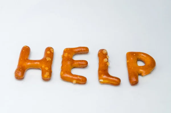 Tuzlu bisküvi harfler yardım — Stok fotoğraf