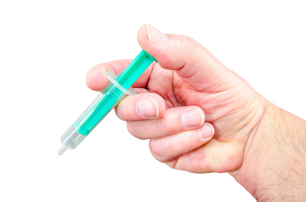 Syringe in the hand