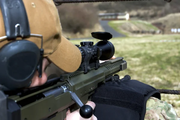 Military sniper aims at a target — Stock Photo, Image