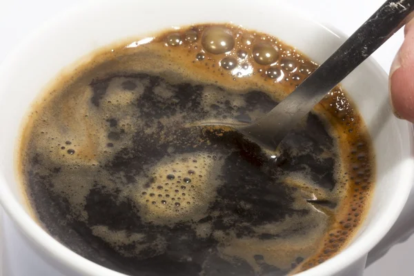 Delicious black coffee in a white cup — Stock Photo, Image