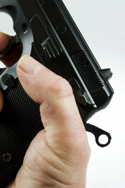 Man pointing a weapon and weapon charges — Stock Photo, Image