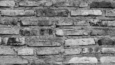 Beyaz ve siyah tuğlalı arka plan tarzı sert çimento, beton kırığı ve kirli yüzeyi olan klasik bir grunge. Duvar kağıdı tasarımı tuğla, tuğla ve taş zemin taşı veya arkaplan tarihi