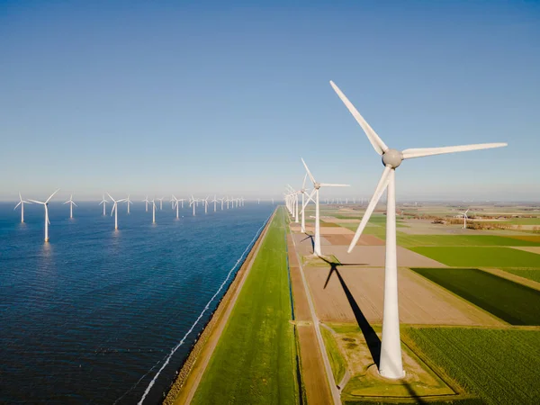 Windmill park in the Netherlands ocean, Windmill farm with huge turbines green energy in the Netherlands Europe